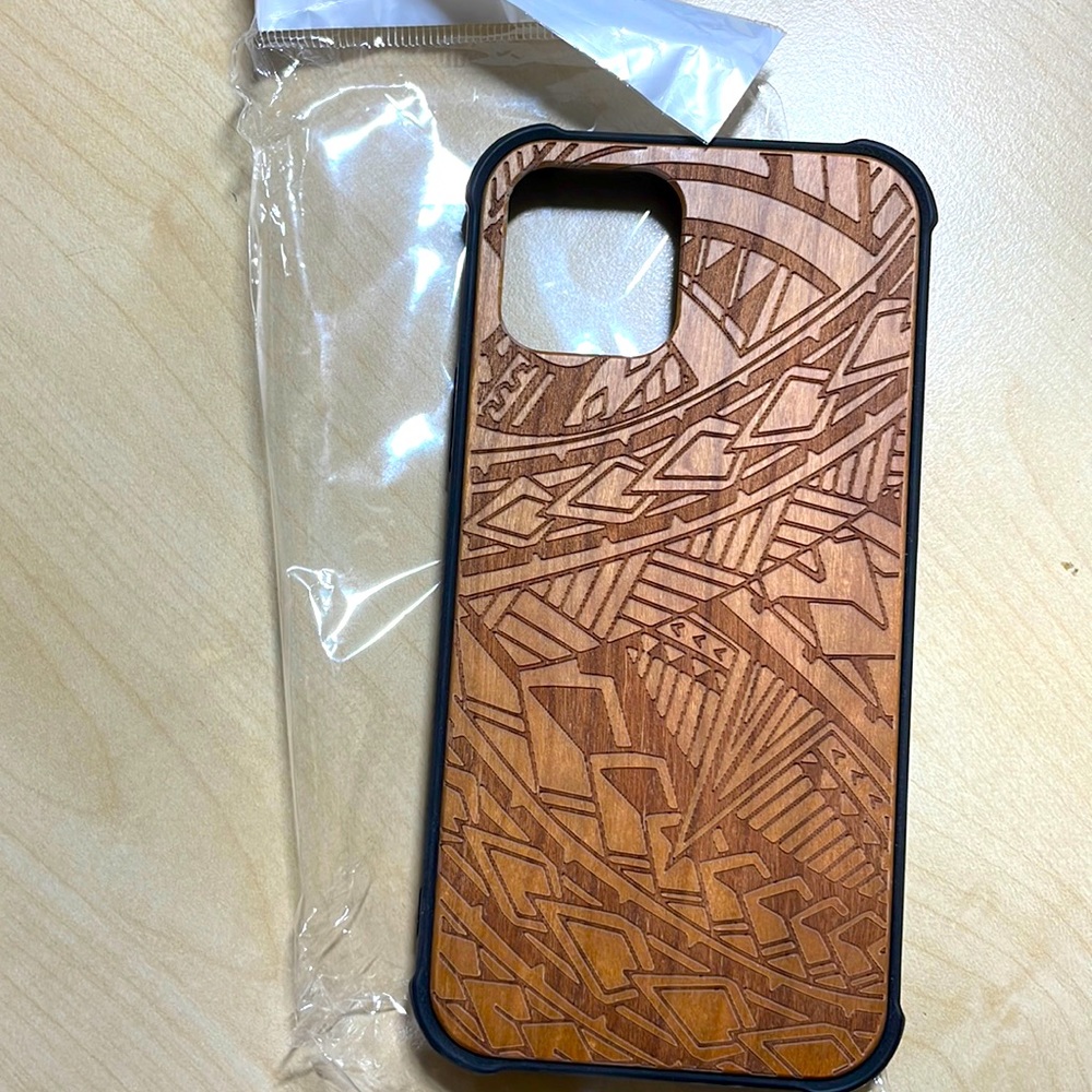 Carved (Polynesian tattoo design) wood iPhone 12 cellphone case - Picture 1 of 3